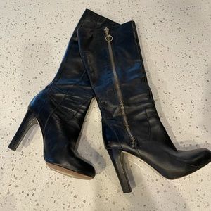 Black leather tall heeled boots